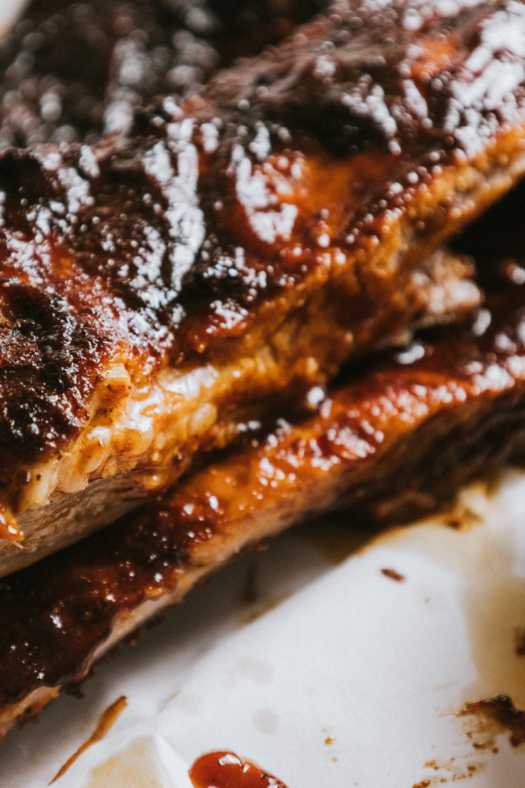 Smoky barbecue ribs made in Ninja Foodi Grill and Ninja Woodfire, tender with caramelized sauce.