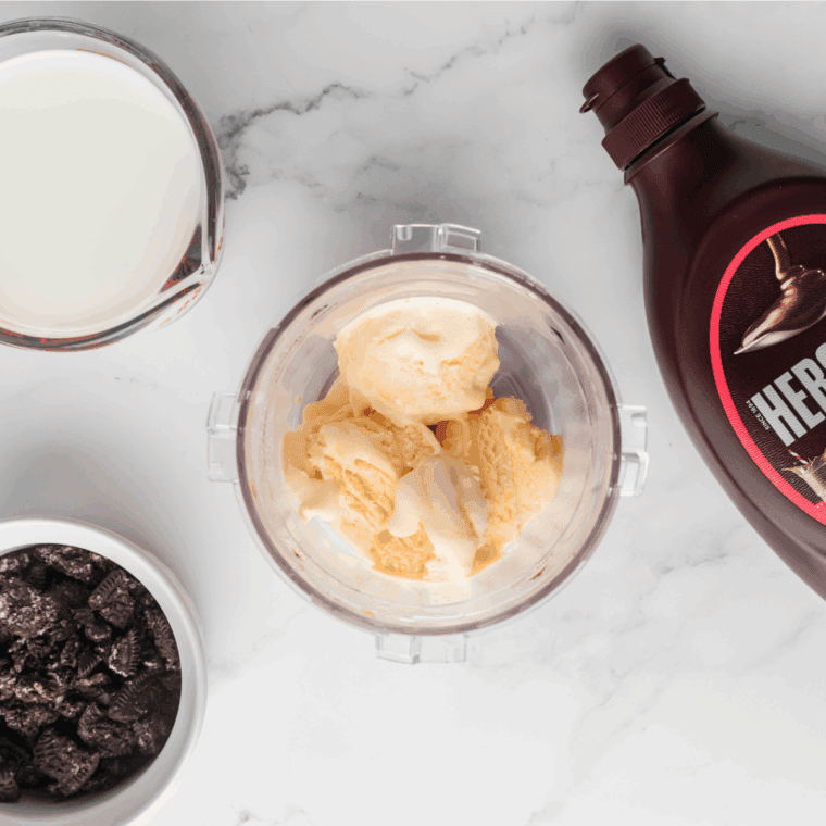 Easy Ninja Creami Oreo Milkshake ingredients on kitchen table. 