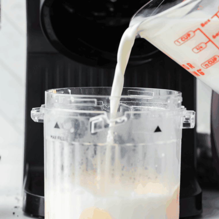 Place the milk and ice cream in the empty Ninja Creami Pint Container. 