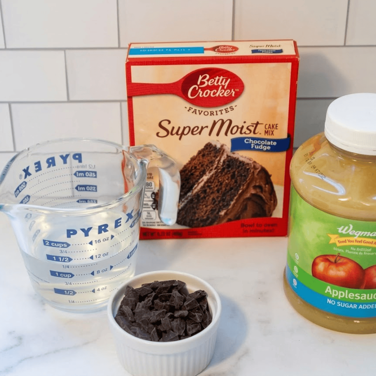 Ingredients needed for Air Fryer Cake Mix Cookies (3 Ingredients) on kitchen table.