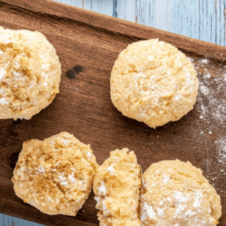 Freshly baked keto cream cheese cookies in the air fryer, soft and golden brown.