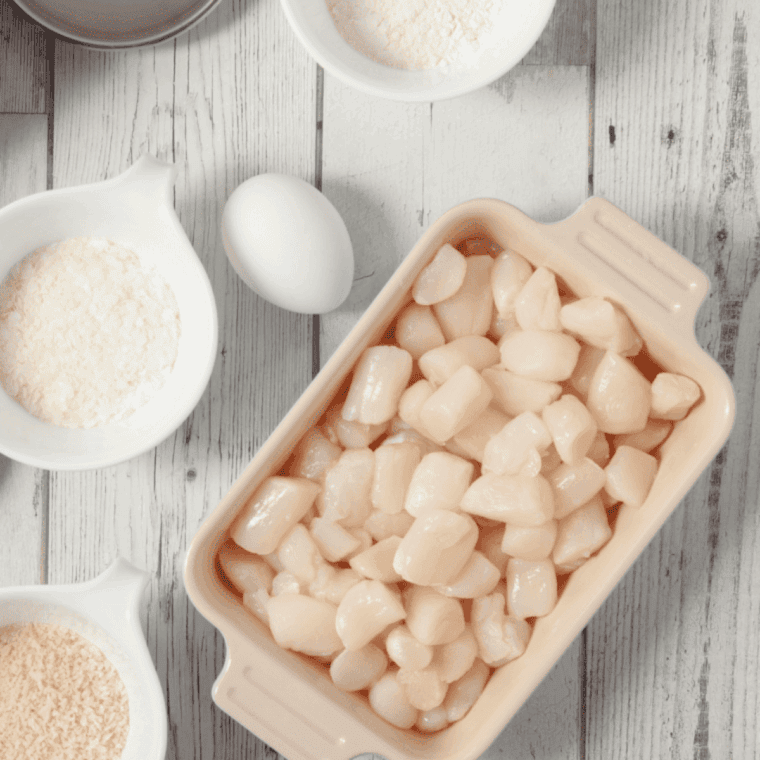 Ingredients needed for Air Fryer Scallops With Ritz Crackers on kitchen table.