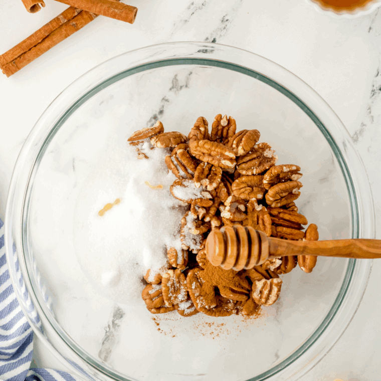 Pecans tossed with brown sugar, ginger, cinnamon, nutmeg, cloves, and salt.