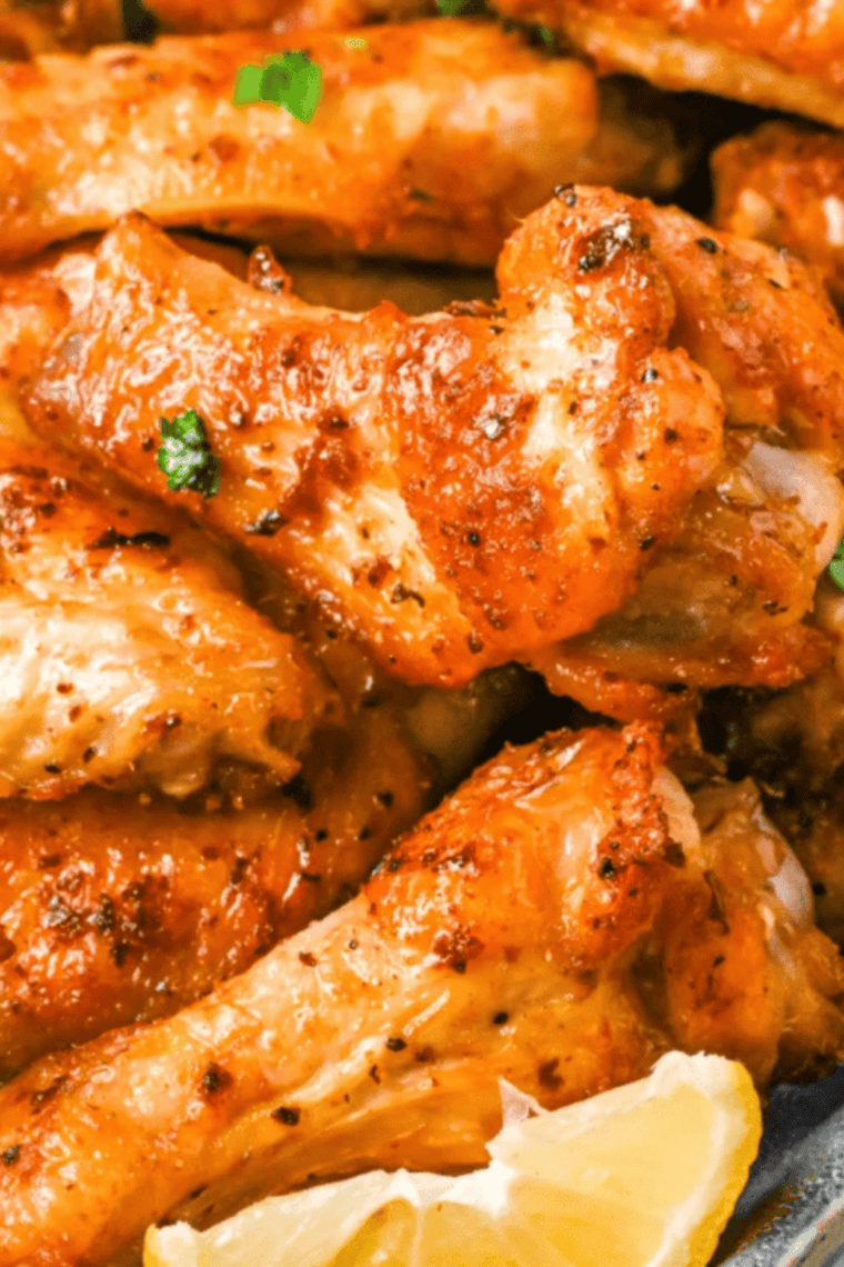 Bowl of crispy chicken wings coated in Wingstop Louisiana Rub seasoning