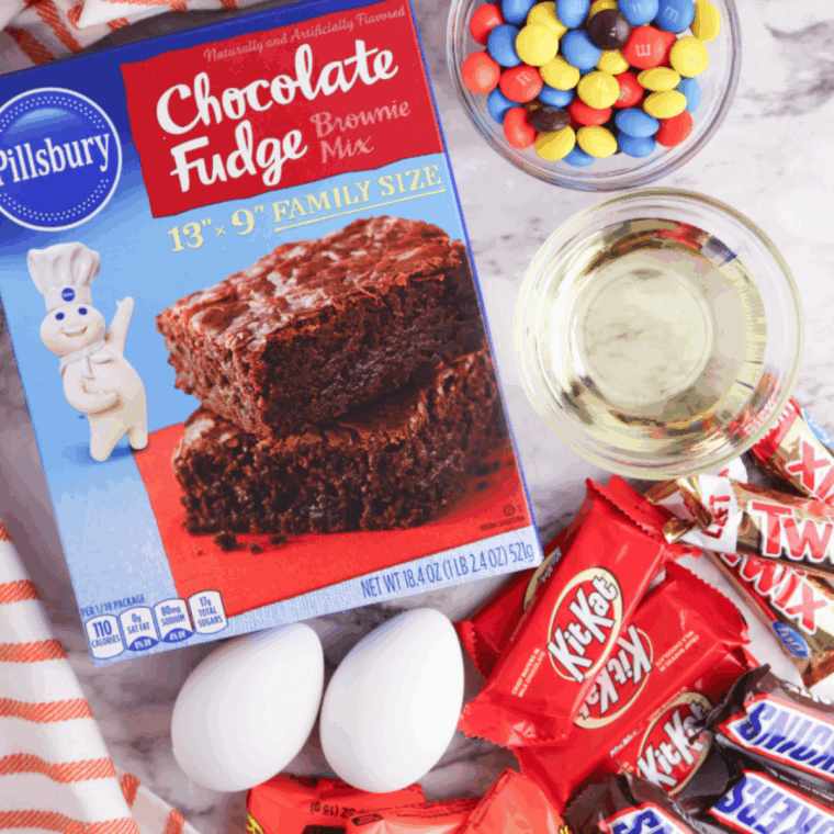 Ingredients needed for Easy Leftover Halloween Candy Brownies on kitchen table.