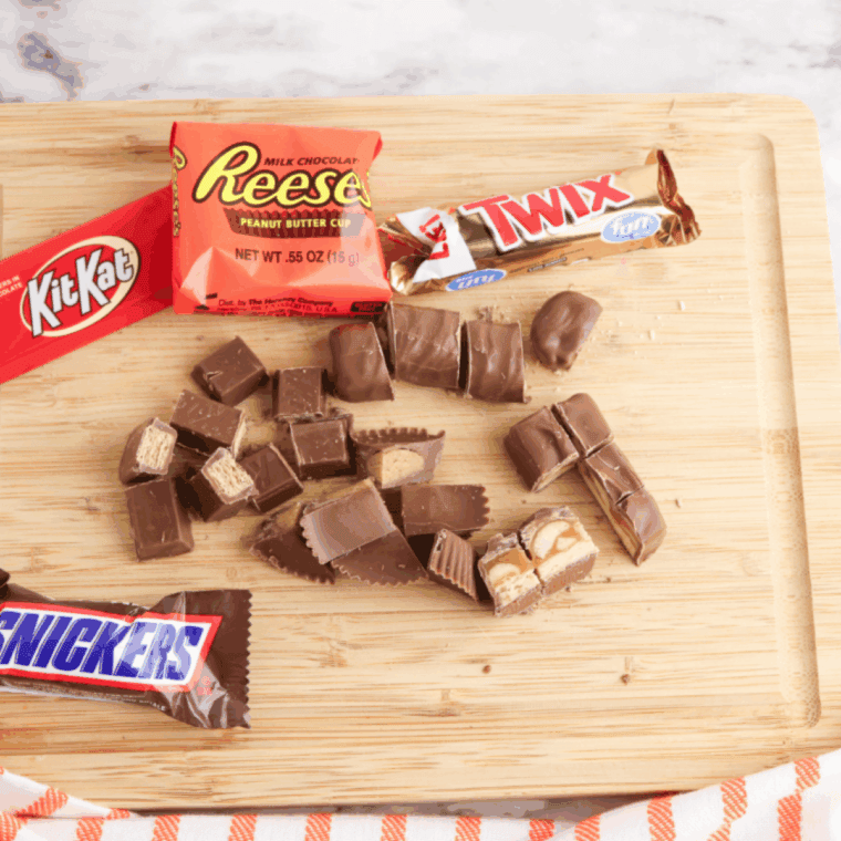 Folding chopped Halloween candy into brownie batter