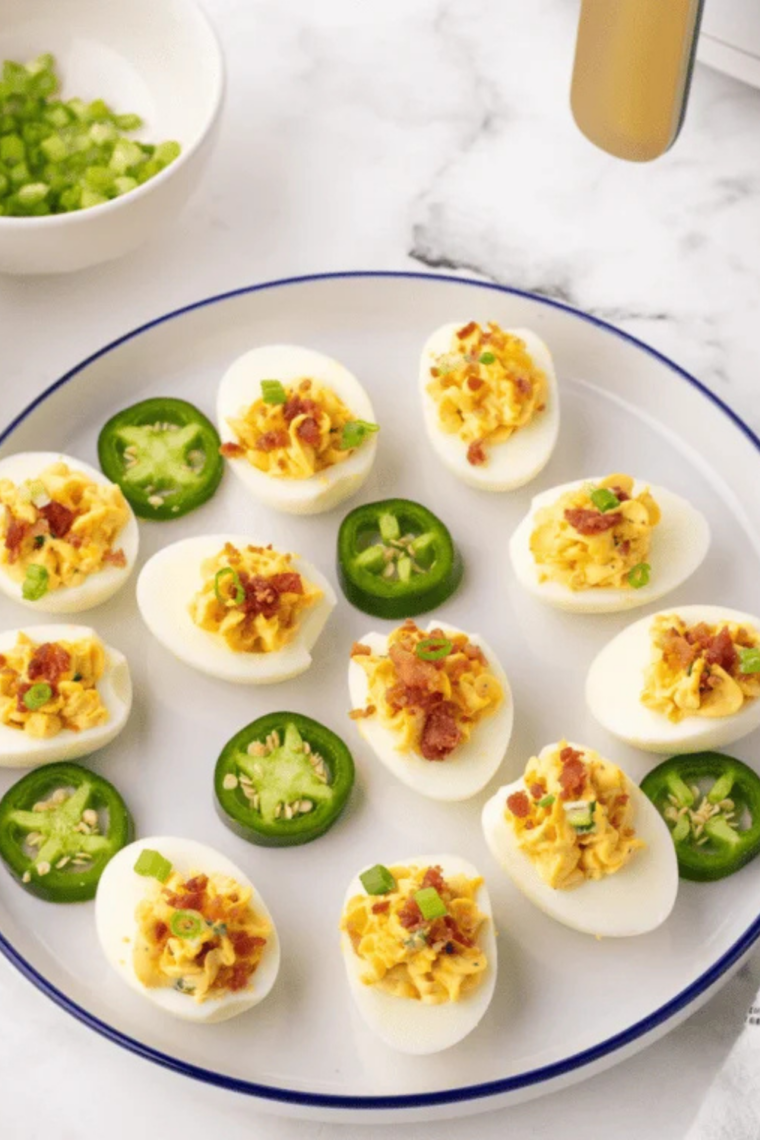 Close-up of creamy deviled eggs without mustard topped with smoked paprika