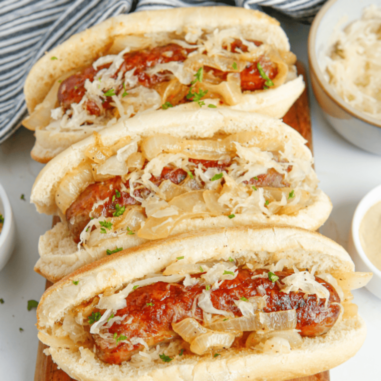 Hot dog buns toasting in an air fryer until warm, golden, and lightly crisp using fast 2-minute methods.