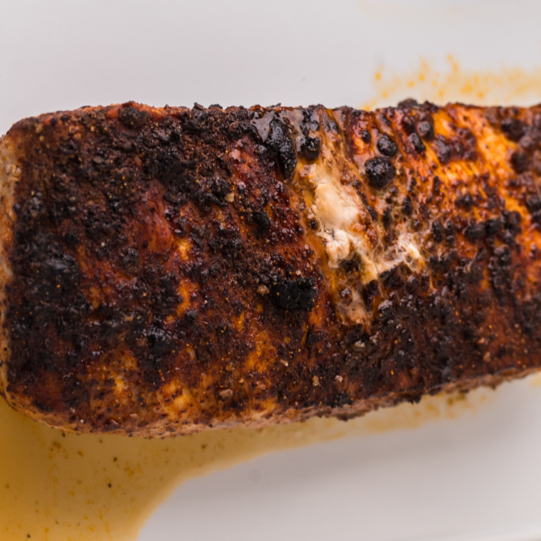 Juicy, sliced pork tenderloin cooked in a Ninja Foodi, perfectly seasoned and ready to serve