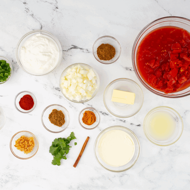 Ingredients needed for Easy Valentina Hot Sauce Recipe on kitchen table.
