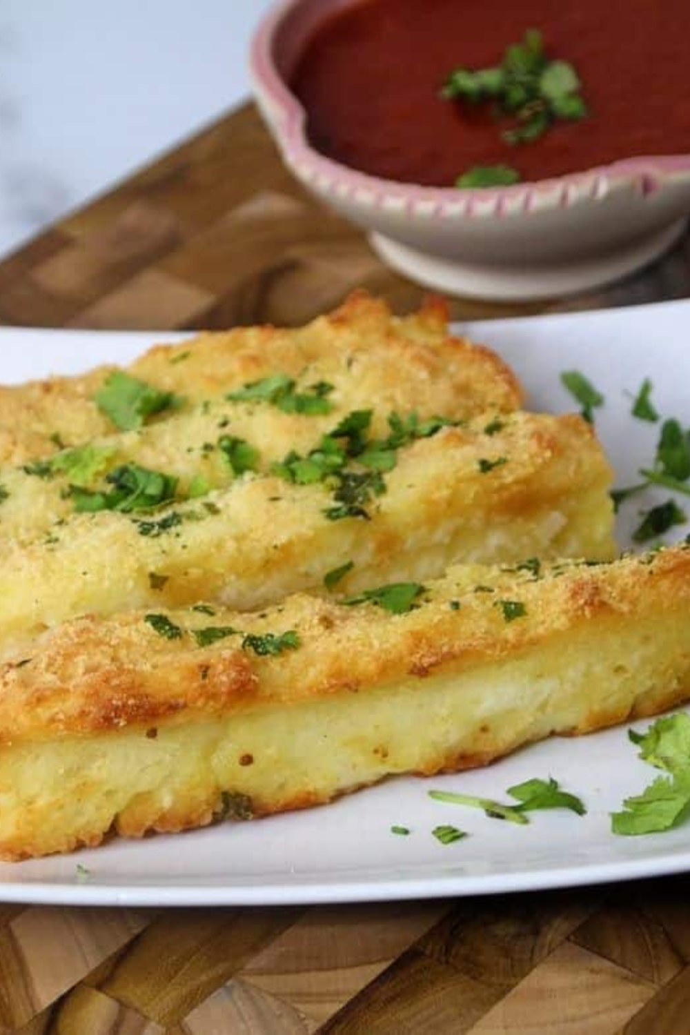 Golden air fryer breadsticks made from two ingredient dough