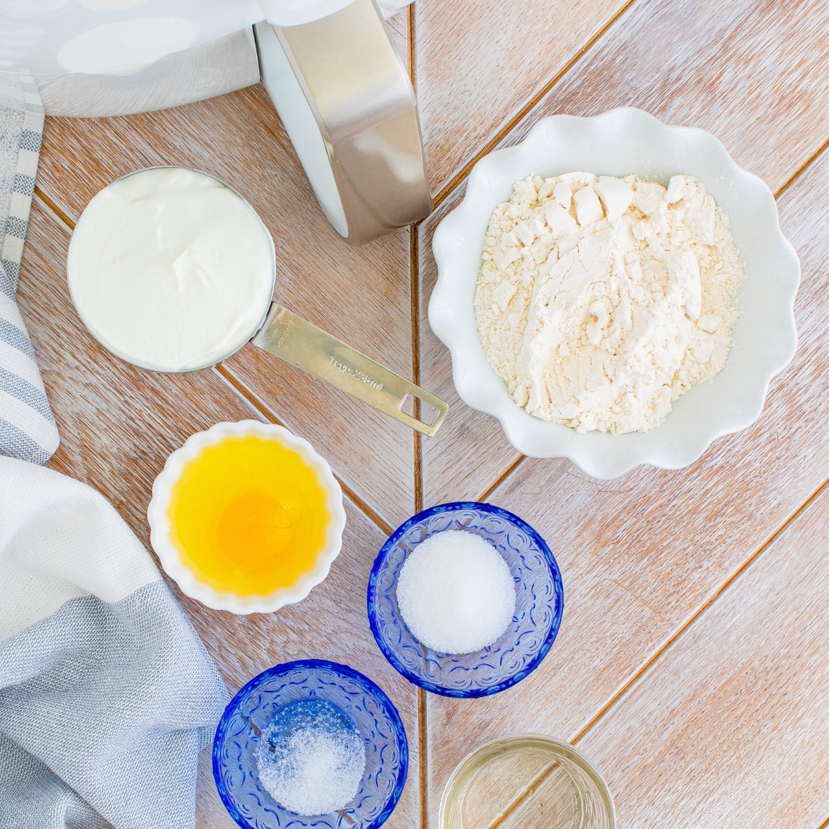 Ingredients needed for Air Fryer Two Ingredient Dough Breadsticks on kitchen table.