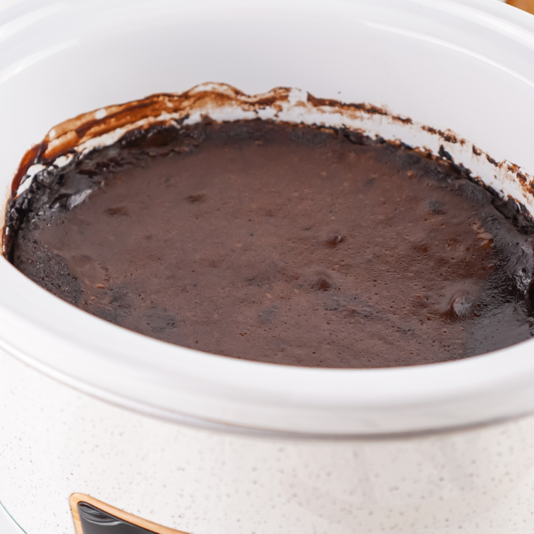 Slow cooker set to high with the lid on while crock pot chocolate cobbler cook