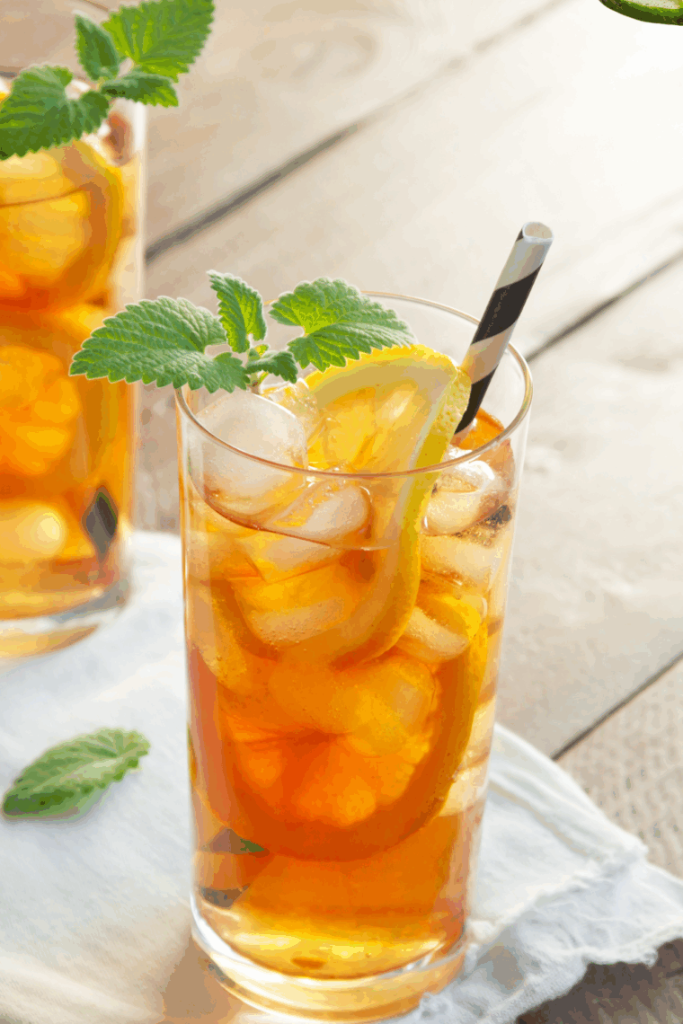 Refreshing copycat McDonald’s sweet tea with lemon wedge.