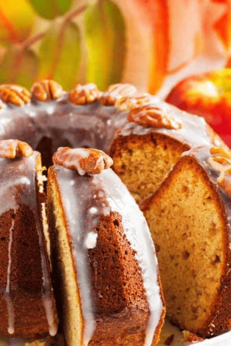 Instant Pot banana pecan bundt cake with moist banana crumb and crunchy pecans served as a homemade dessert slice