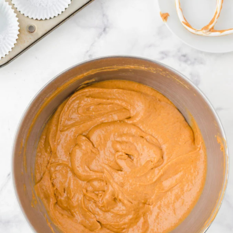 Orange pumpkin bread batter mixed just until combined with a rubber spatula