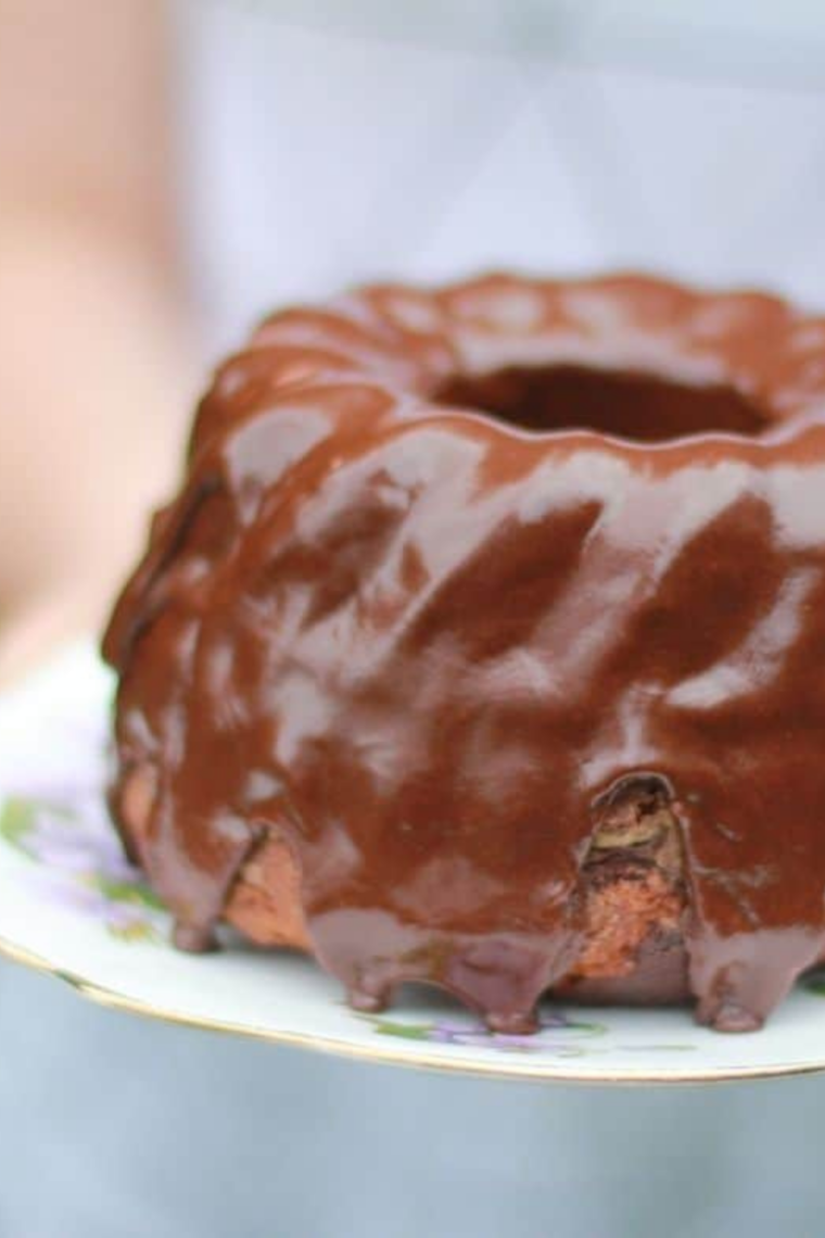 Fluffy instant pot cake made from boxed cake mix sliced and served on a plate with soft tender crumb
