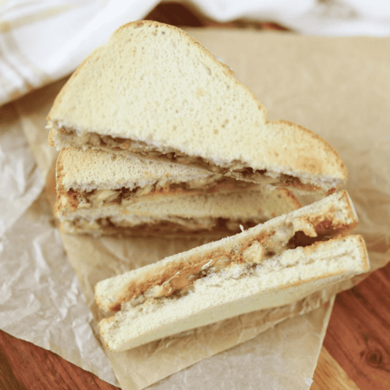 Air Fryer Peanut Butter and Banana Sandwich with crispy golden bread and melted peanut butter and banana filling.