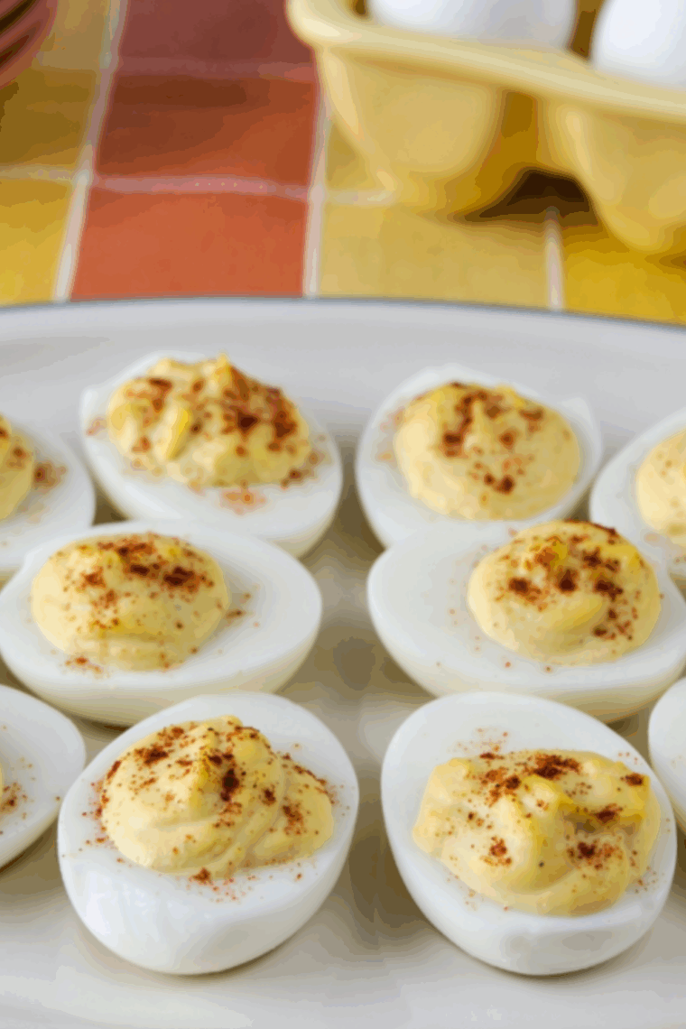 A platter of air fryer Southern deviled eggs garnished with paprika, ready to serve
