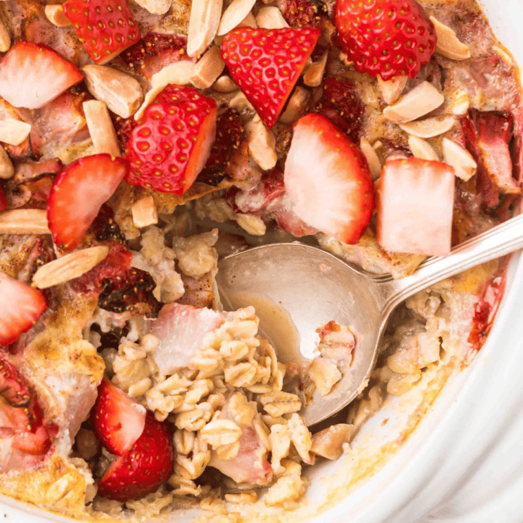 A bowl of air-fried strawberry oatmeal ready to be eaten.