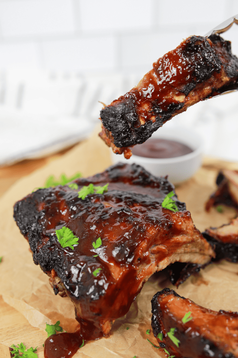 Delicious homemade Longhorn Steakhouse-style ribs, tender and smoky, glazed with barbecue sauce.