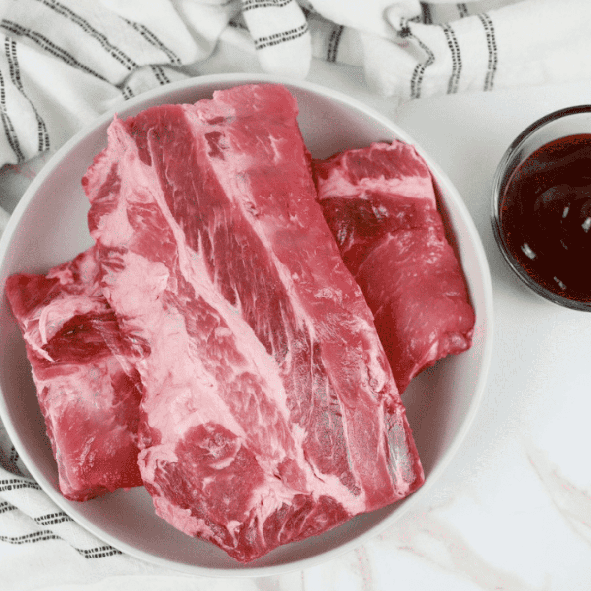 Ingredients needed for Longhorn Steakhouse Rib Recipe on kitchen table.