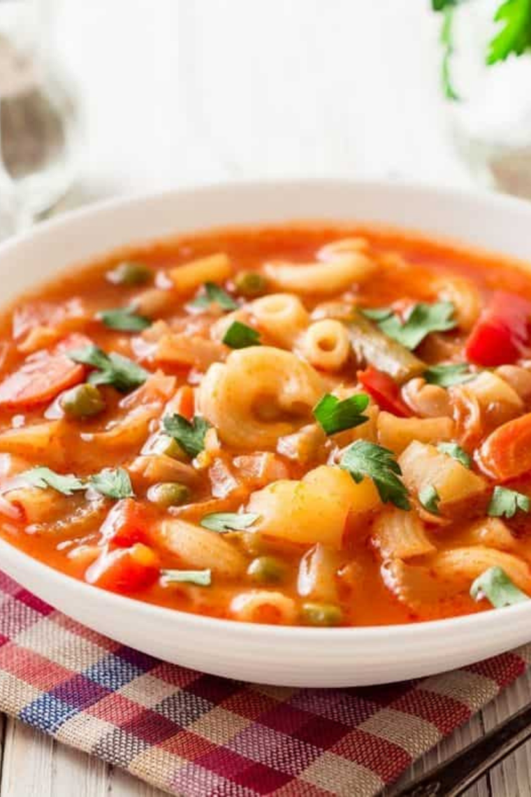 Copycat Olive Garden minestrone soup made in the Instant Pot with mixed vegetables and small pasta noodles