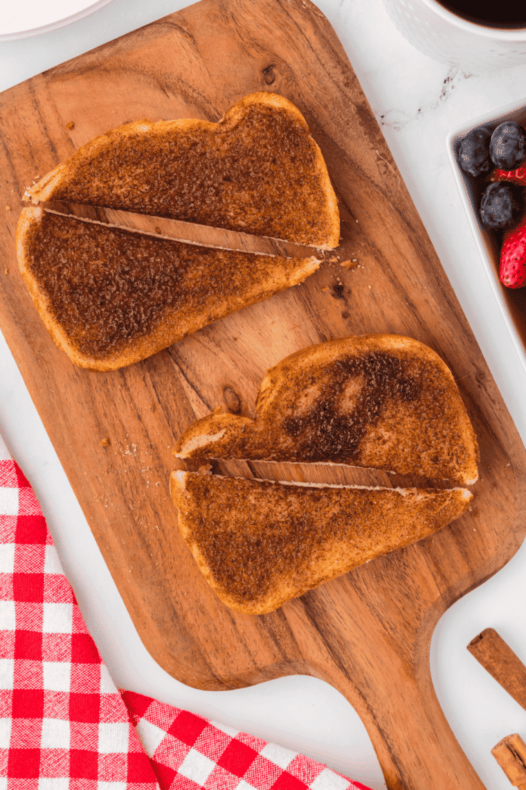 Overhead of crispy cinnamon toast cut into 4 slices