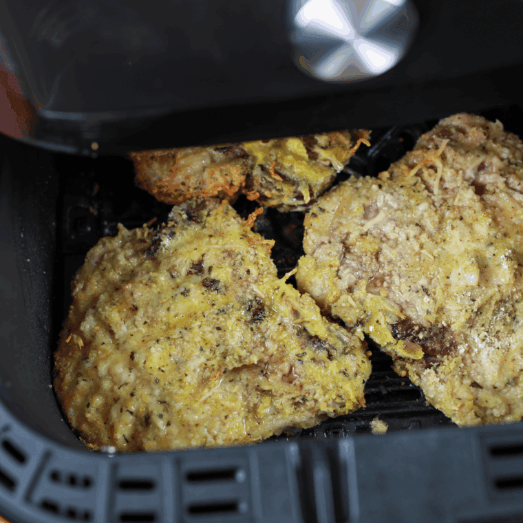 Breading pork chops and placing into air fryer