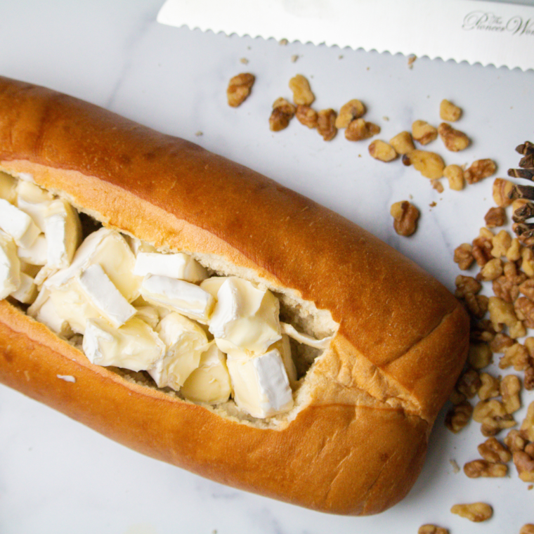 Add the brie to the middle of the bread.