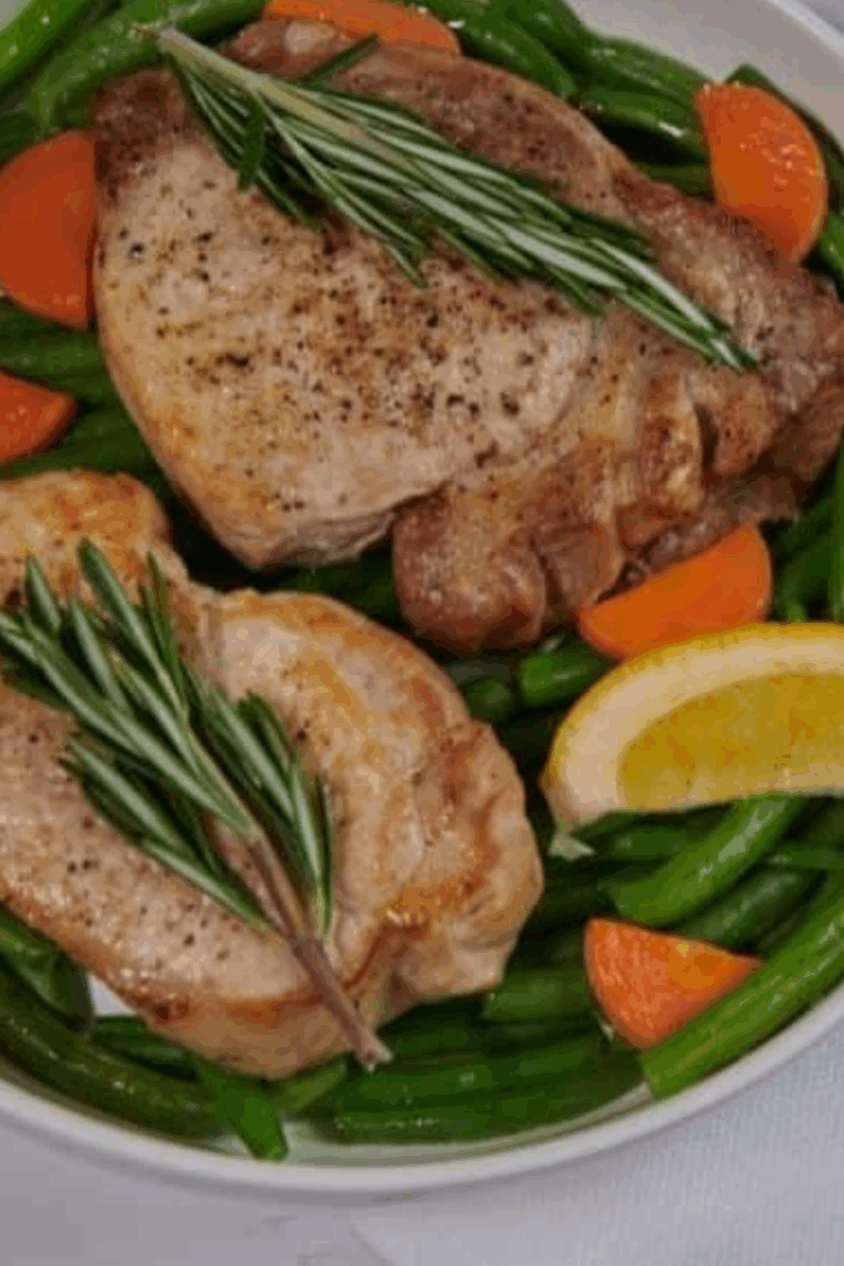 Air fryer blackened pork chops cooked golden brown with a crispy, spicy crust, served and ready to eat.