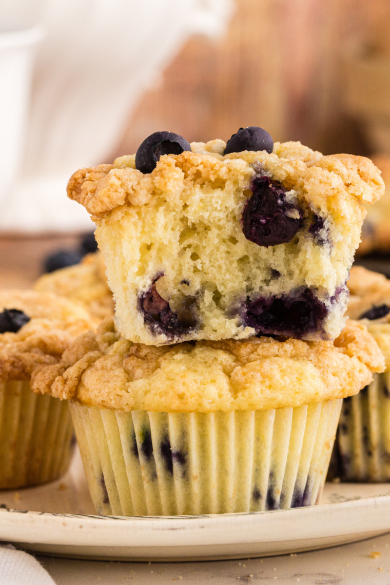Plate of air fryer blueberry streusel muffins
