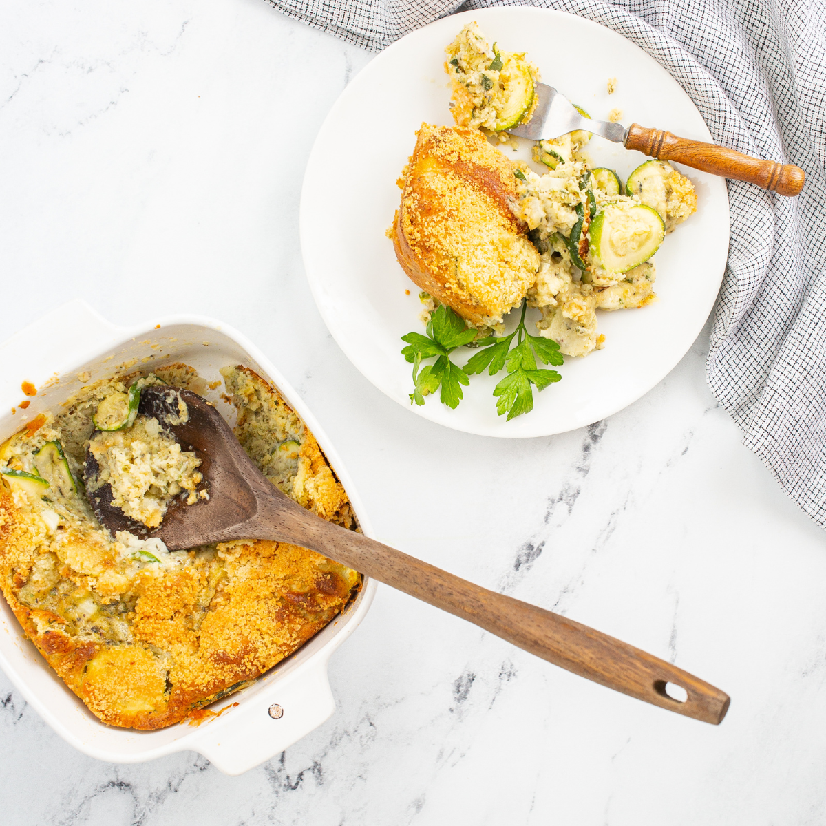 Baked zucchini casserole with a golden, crispy cheese topping