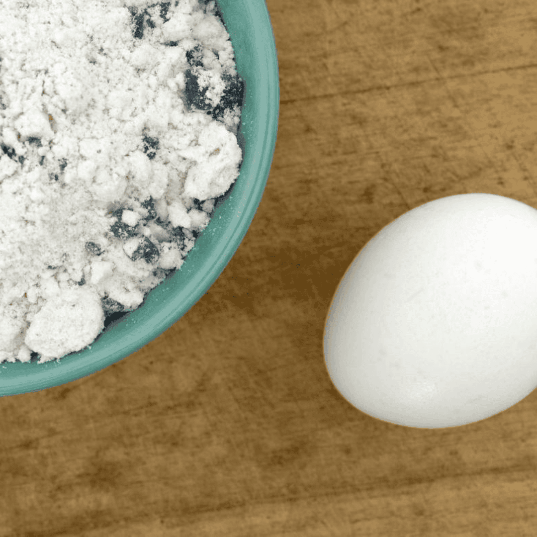 Ingredients needed for Air Fryer Blueberry Muffin Bites on kitchen table.