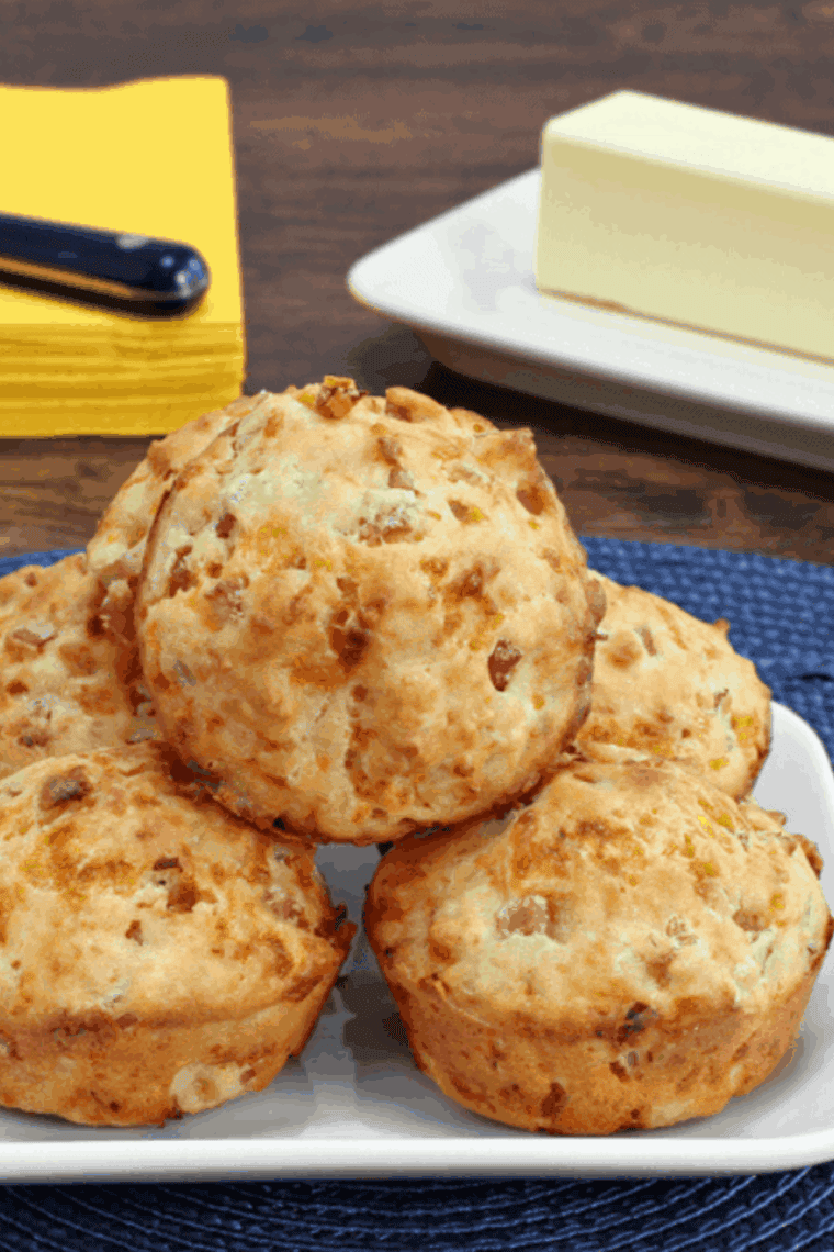 Golden air fryer savory muffins with crispy bacon, cheddar, and fresh basil