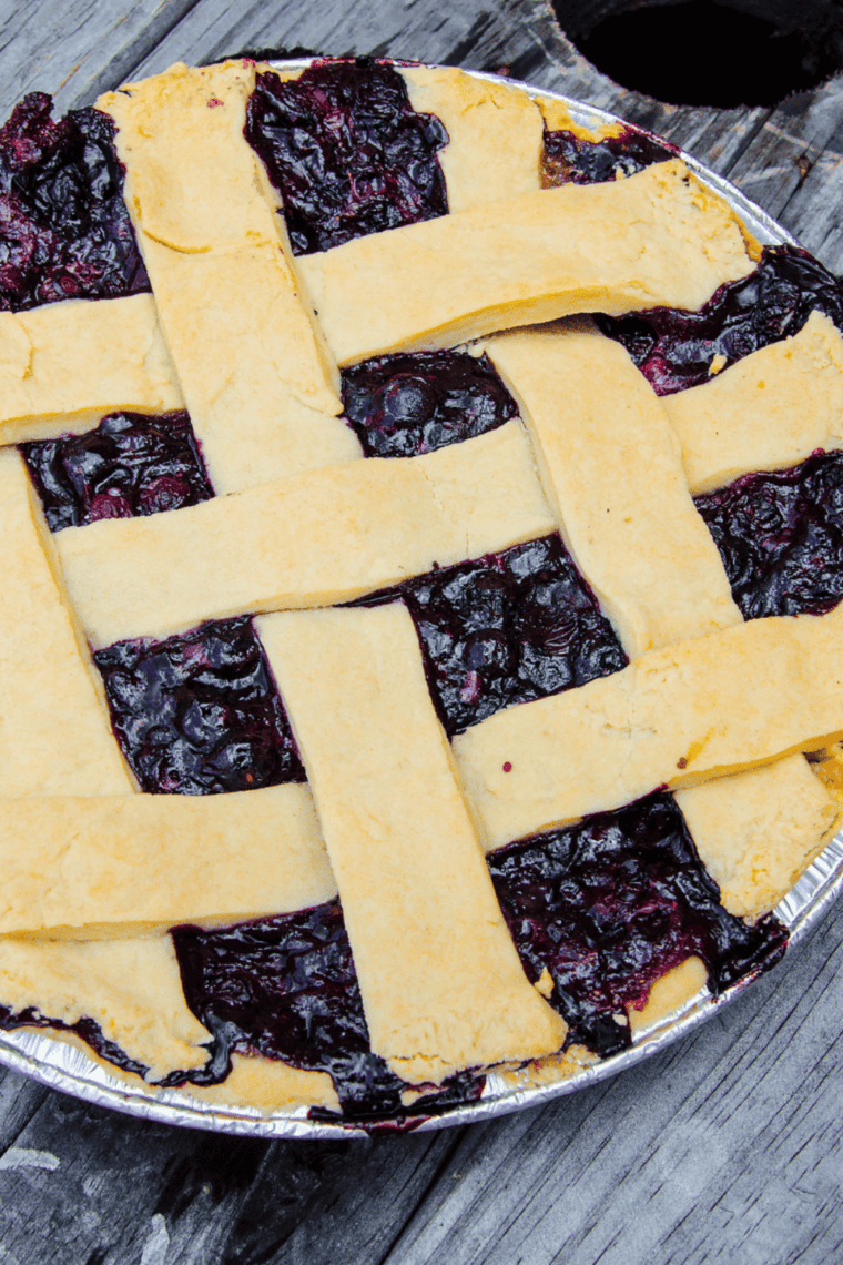 Golden air fryer blueberry pie with flaky crust and sweet blueberry filling