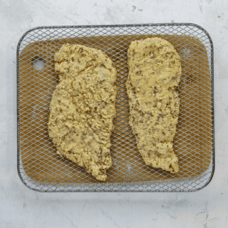 Air fryer set to 370°F, chicken cooking for 12-15 minutes with a flip halfway, internal temperature checked to reach 165°F before serving.