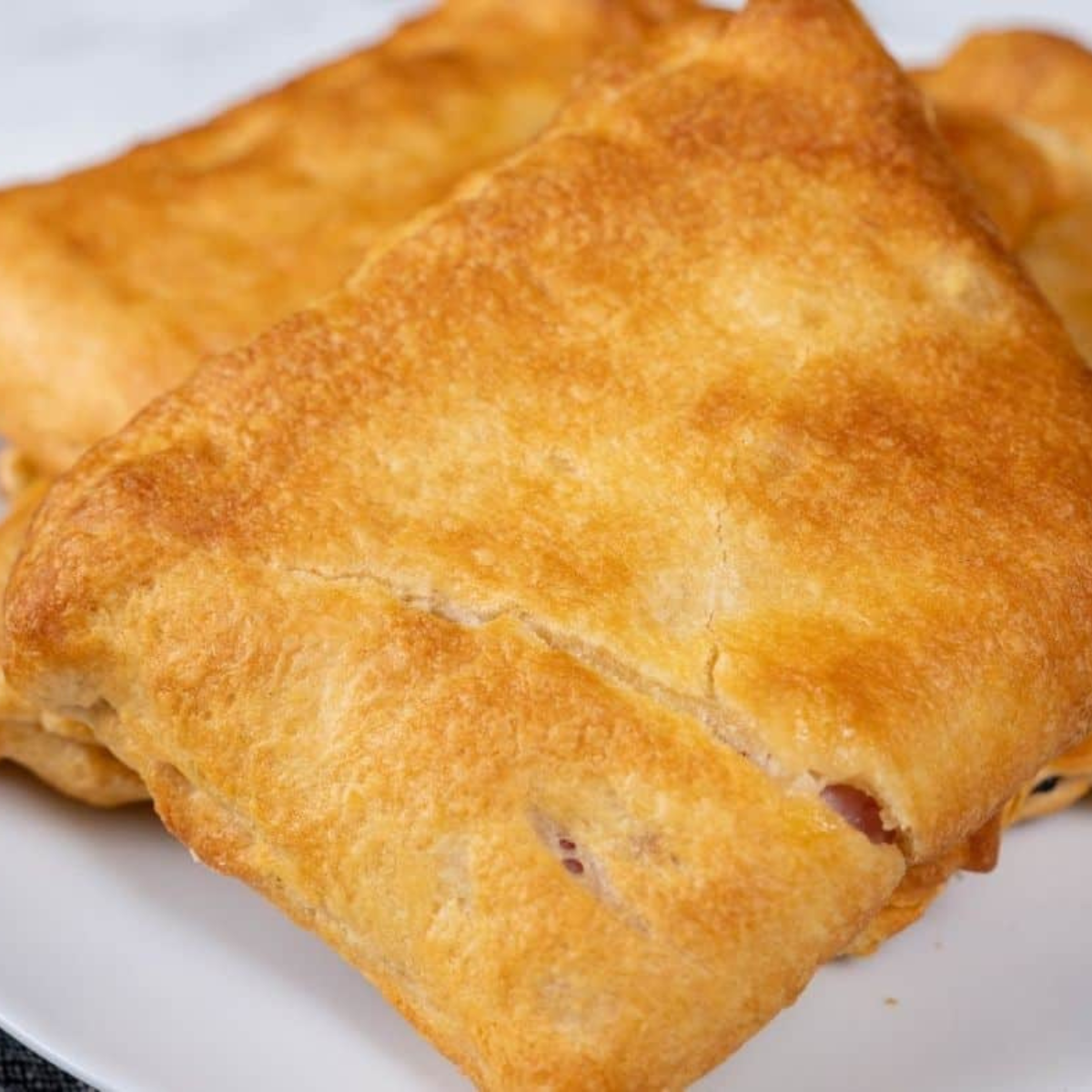 Cook the Air Fryer Ham and Cheese Pockets for 6 to 8 minutes at 350 degrees F