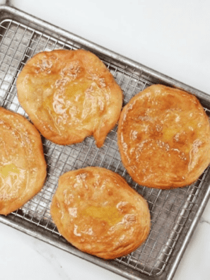 Golden air fryer Navajo fry bread puffed and crispy on plate