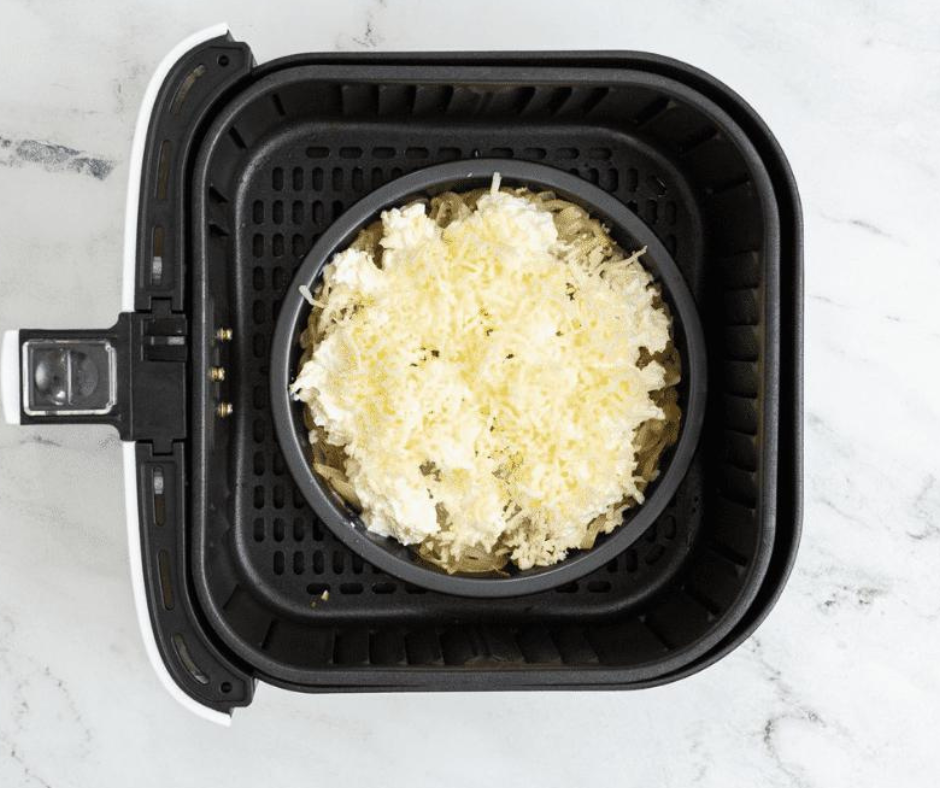 Air Fryer French Onion Dip in air fryer basket.