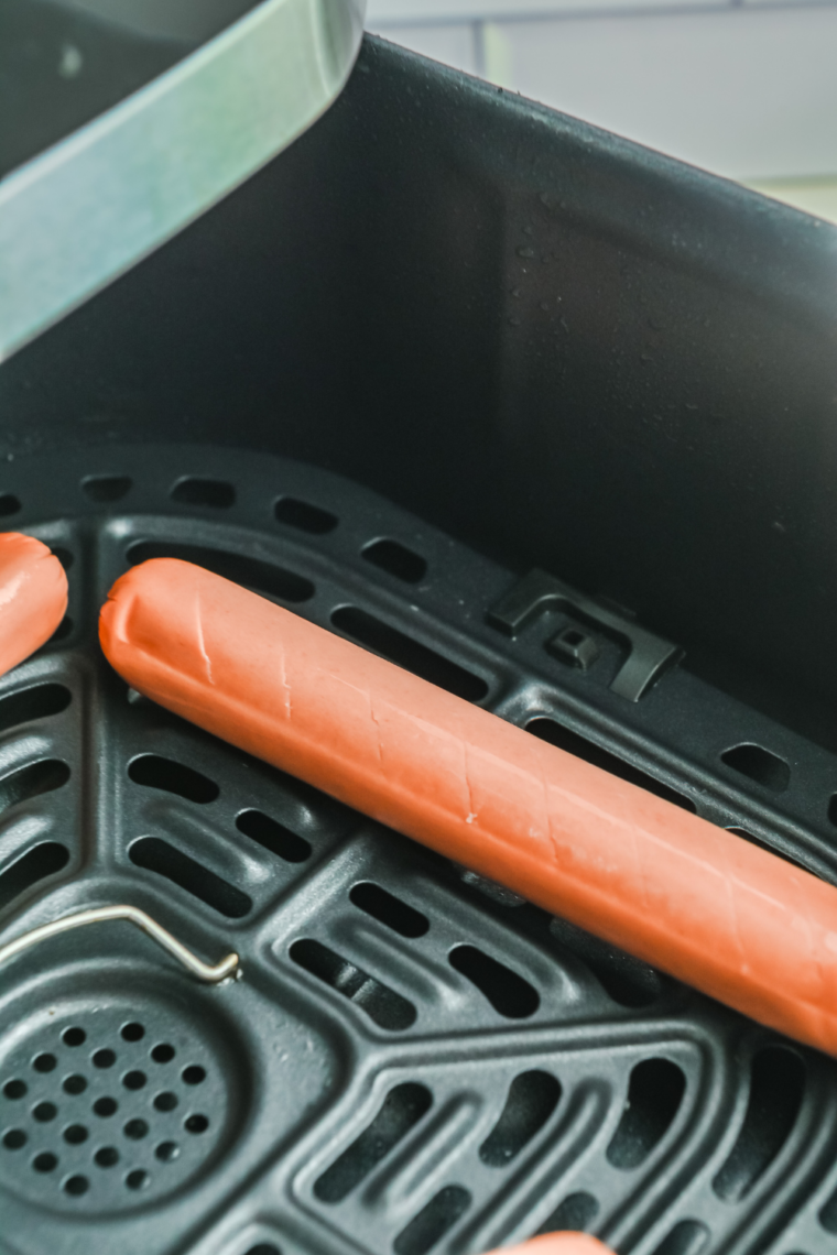 Air fryer preheated to 400°F for quick hot dog cooking and crisping.