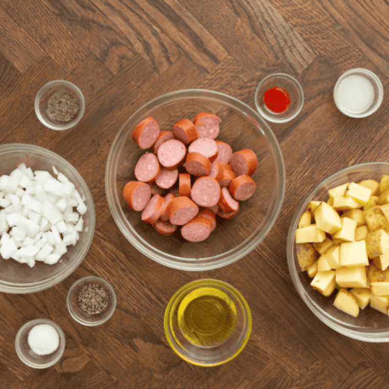 Ingredients needed for Air Fryer Kielbasa and Potatoes on kitchen table.