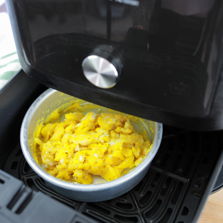 Softly scrambled eggs in a skillet for air fryer sausage biscuits