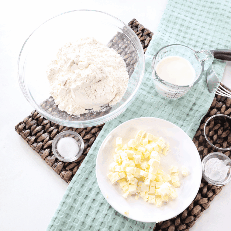 Ingredients needed for Copycat Waffle House Biscuits Recipe on kitchen table.