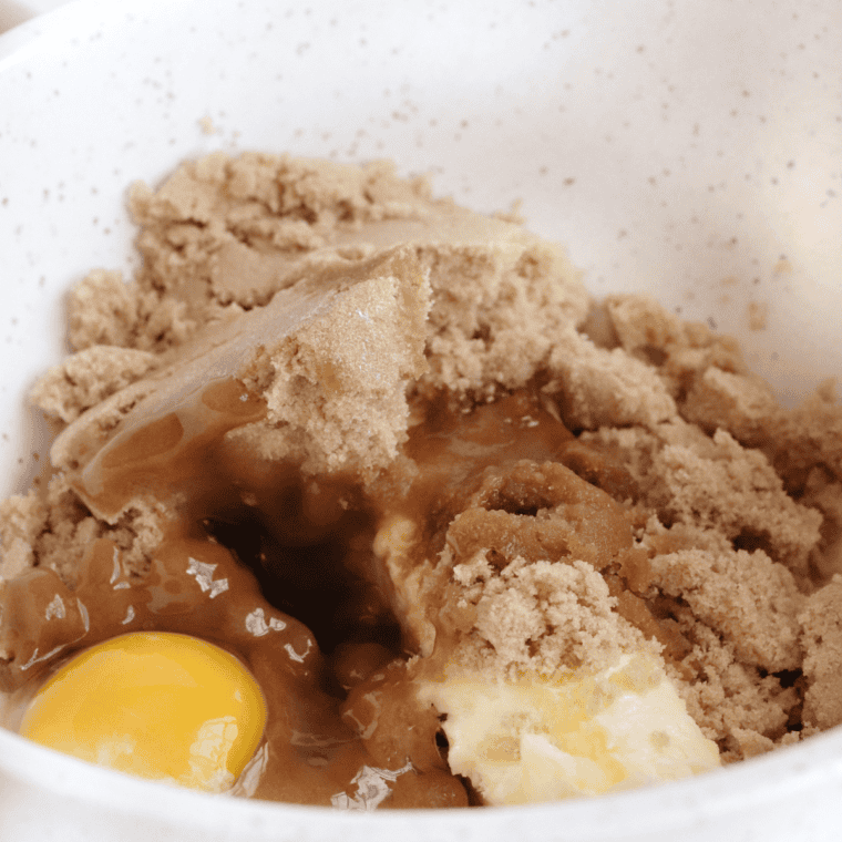 Creaming butter and sugars in a large bowl, then beating in egg and vanilla until smooth.
