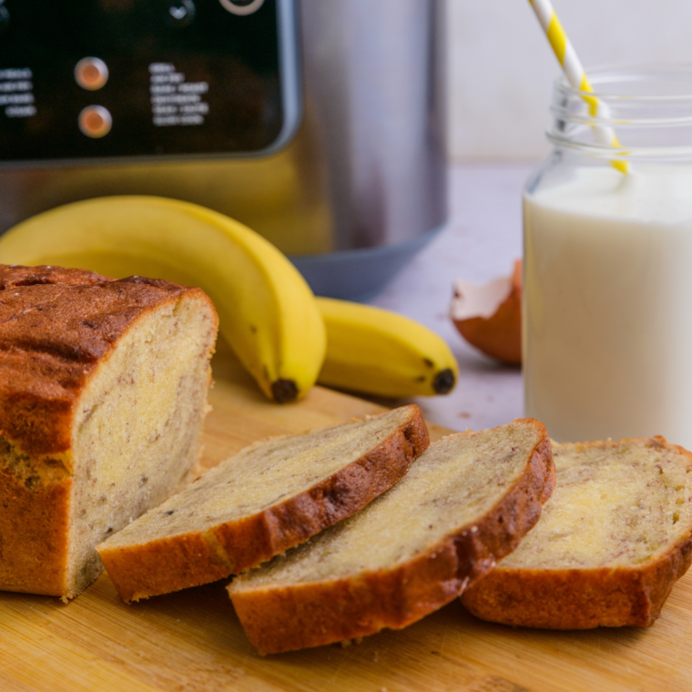 Two mini loaves of banana bread baked golden brown in the Ninja Crispi