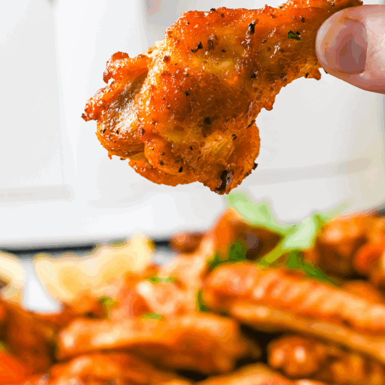 Golden and crispy Air Fryer Chinese Salt and Pepper Chicken Wings, seasoned with a savory salt and pepper blend for a delicious snack or meal.