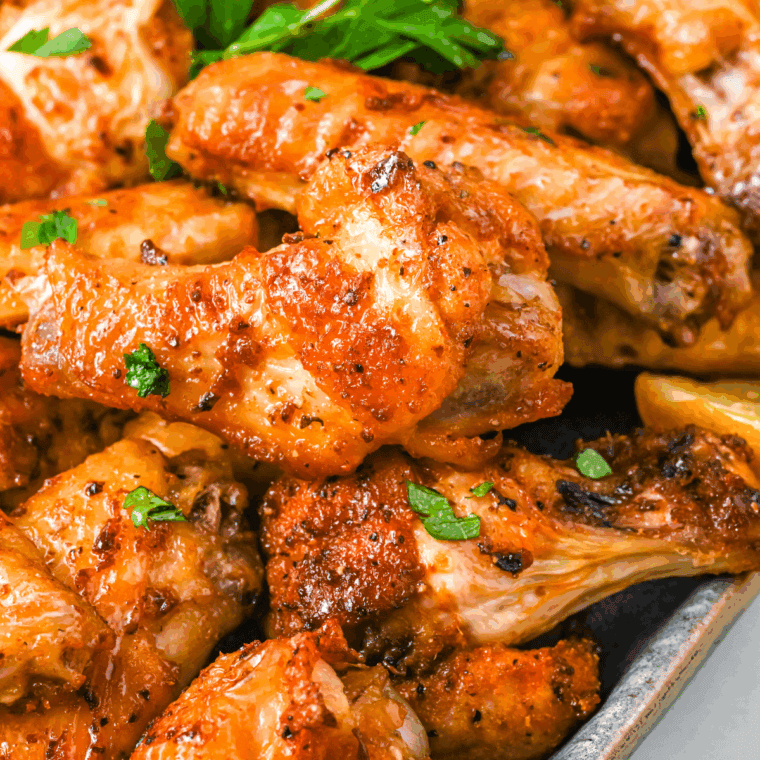Golden, crispy Air Fryer Chinese Salt and Pepper Chicken Wings, seasoned with salt, pepper, and garlic, perfect for a savory treat.