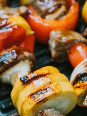 Marinated beef kabobs with peppers and onions on skewers