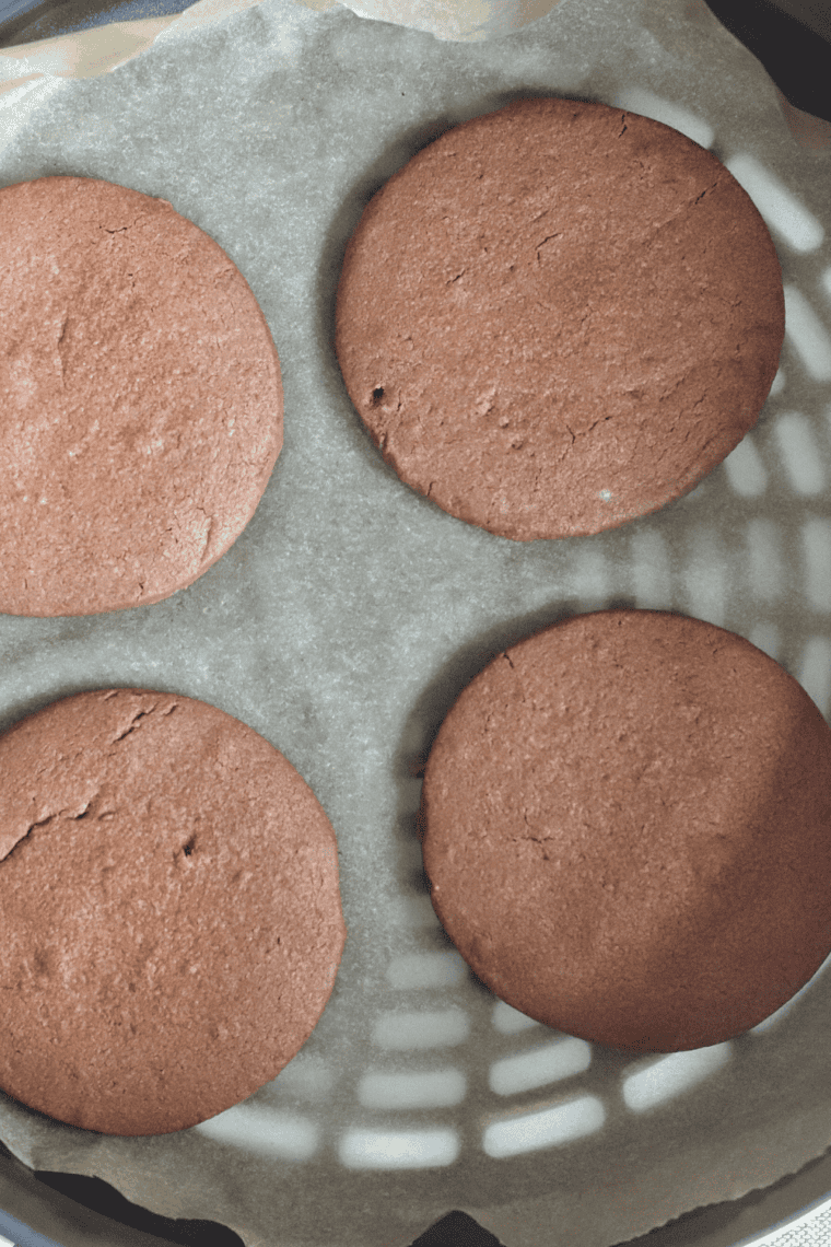 Soft and gooey Nutella cookies freshly baked in an air fryer, made with only three simple ingredients.